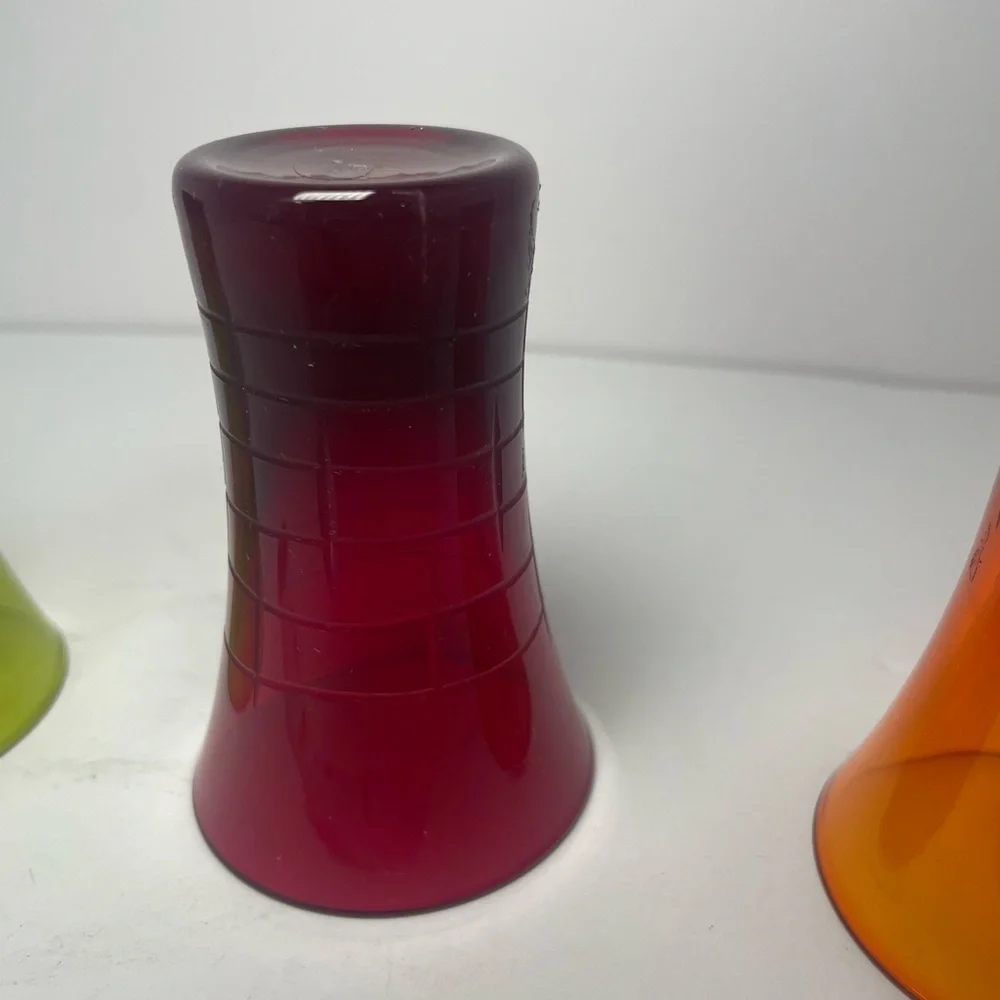 Vintage patterned multicolored shooter glasses.